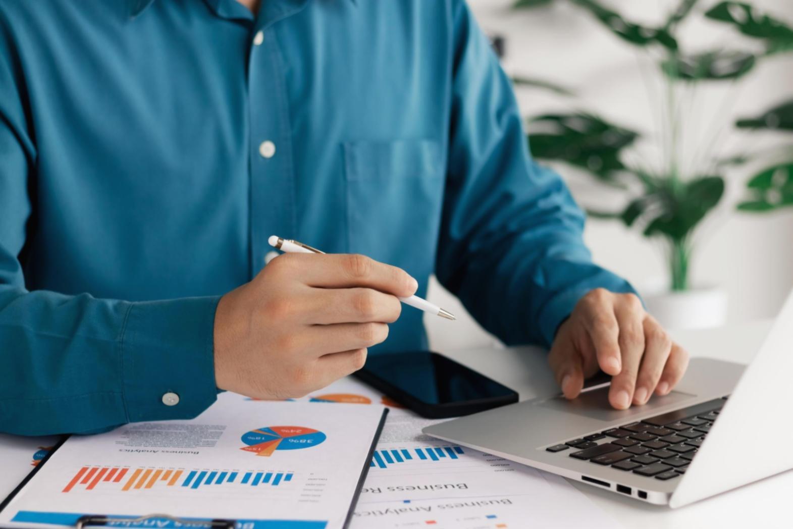 Financial professionals working collaboratively on communication strategies